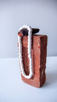 Cigar, Pearls, and Brick 1, 2010
